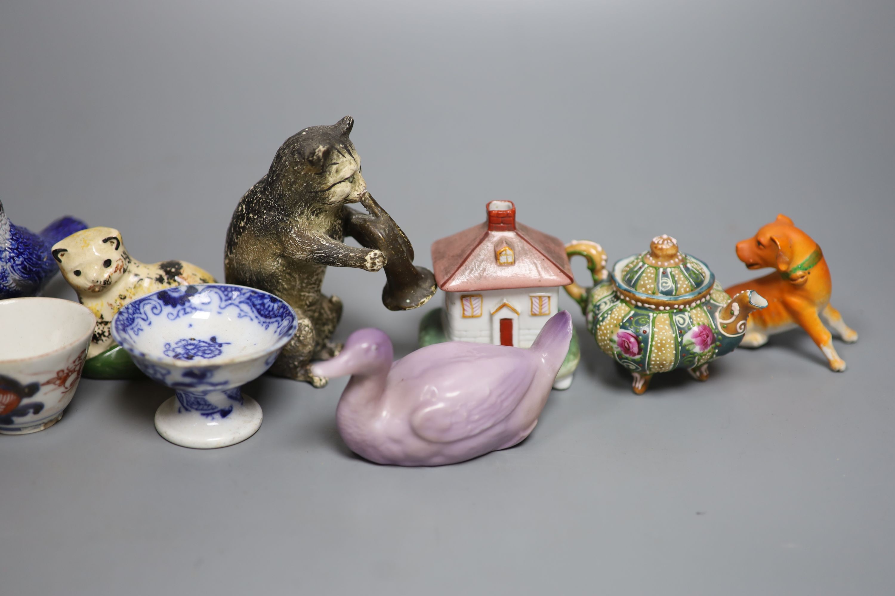A quantity of miniature ceramic pots, figurines, animal ornaments etc